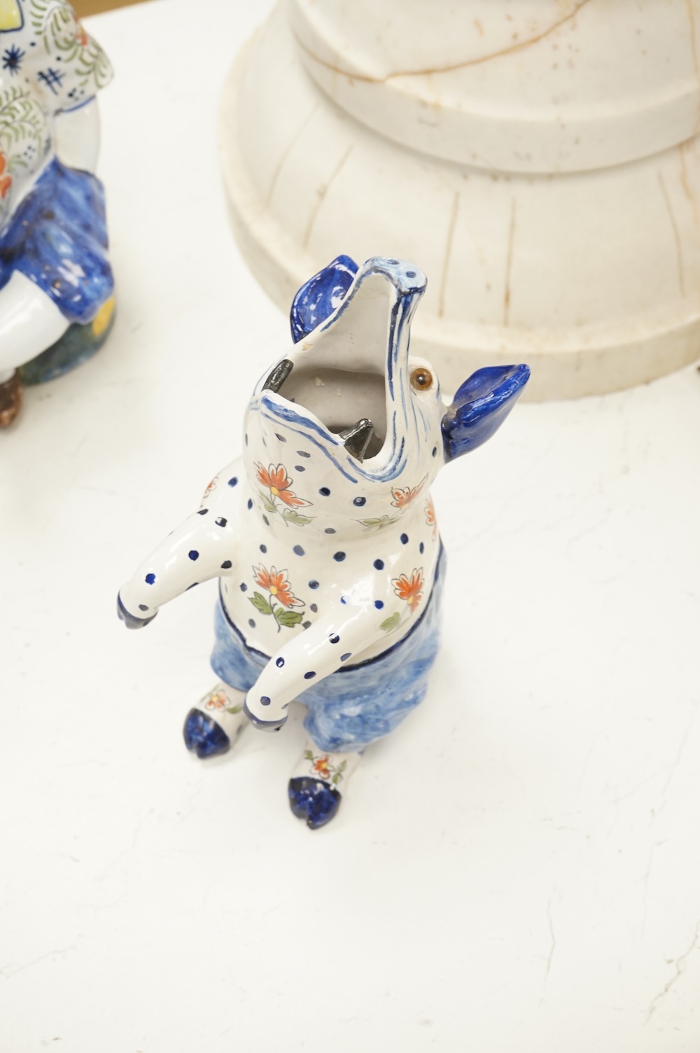 A group of five pieces of French tin glazed pottery, tallest 32cm
